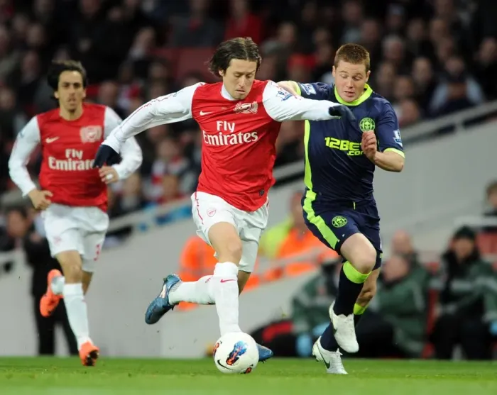 Framed Print : Arsenal vs. Wigan: Rosicky vs. McCarthy - Premier League Tussle Framed Print : Arsenal vs. Wigan: Rosicky vs. McCarthy - Premier League Tussle