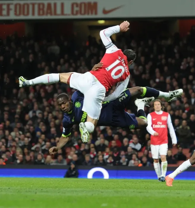Framed Print : Arsenal vs. Wigan: Van Persie vs. Figueroa in Intense Battle Framed Print : Arsenal vs. Wigan: Van Persie vs. Figueroa in Intense Battle