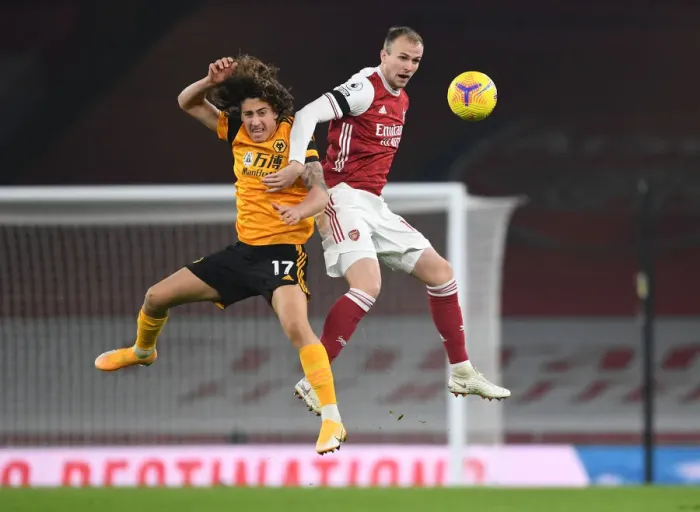 Framed Print : Arsenal vs. Wolverhampton Wanderers: Rob Holding's Heading Duel in Empty Emirates Stadium (Premier League 2020-21) Framed Print : Arsenal vs. Wolverhampton Wanderers: Rob Holding's Heading Duel in Empty Emirates Stadium (Premier League 2020-21)