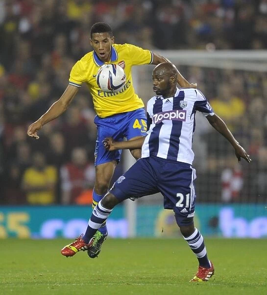 Arsenal and West Bromwich Albion Draw 1-1 in Capital One Cup: Isaac Hayden and Youssouf Mulumbu Battle it Out in Penalty Shootout