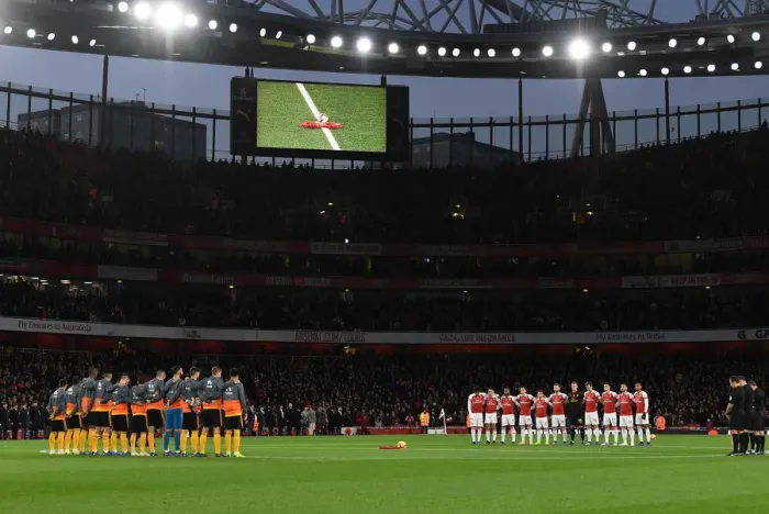 Framed Print : Arsenal and Wolves Players Honor Minutes Silence Before Premier League Clash (2018-19) Framed Print : Arsenal and Wolves Players Honor Minutes Silence Before Premier League Clash (2018-19)