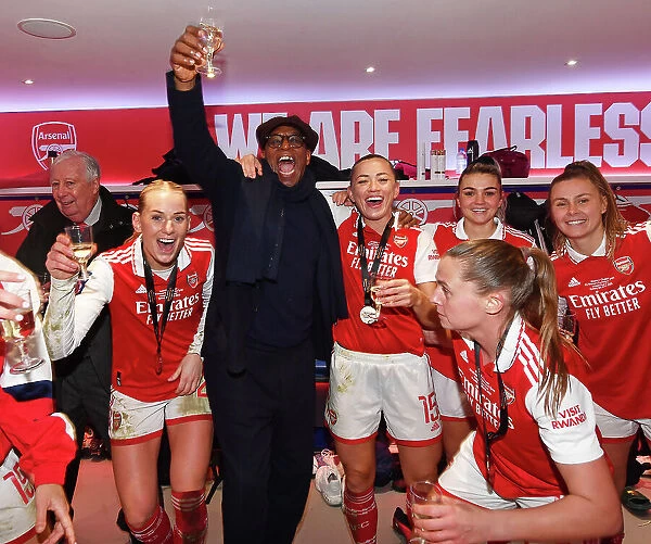 Arsenal Women Celebrate Conti Cup Triumph: Ian Wright and Team Rejoice with the Trophy