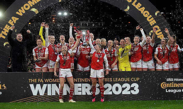 Arsenal Women Celebrate Conti Cup Victory: Leah Williamson and Kim Little Lift the Trophy
