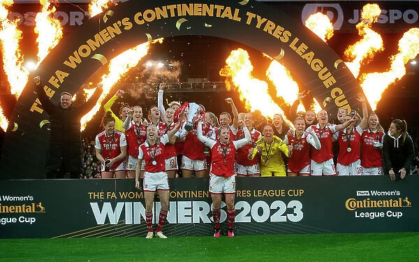 Arsenal Women Celebrate FA WSL Cup Victory: Leah Williamson and Kim Little Lift the Trophy (2023)