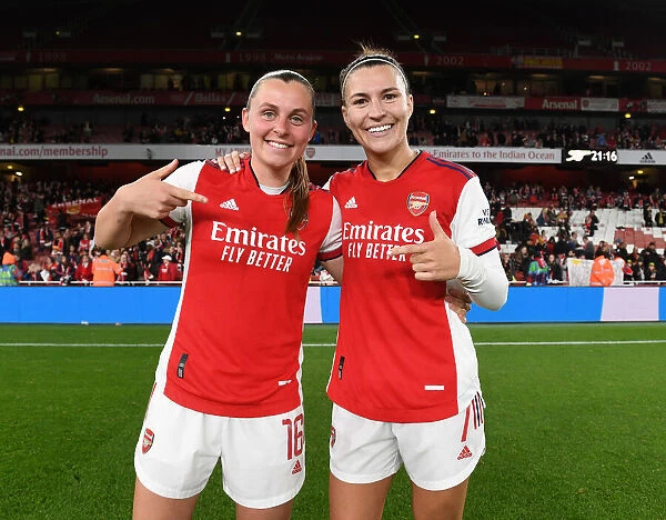 Arsenal Women Celebrate FA WSL Title: Noelle Maritz and Steph Catley Embrace Victory