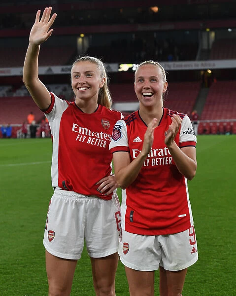 Arsenal Women Celebrate FA WSL Title Win: Leah Williamson and Beth Mead Rejoice in Victory over Tottenham Hotspur