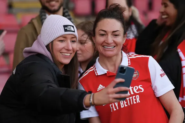 Framed Print : Arsenal Women Celebrate FA WSL Victory: Jodie Taylor Amidst Cheering Fans