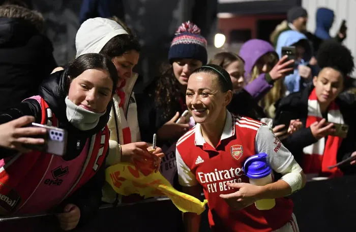 Framed Print : Arsenal Women Celebrate FA WSL Victory: Katie McCabe Amidst Jubilant Fans