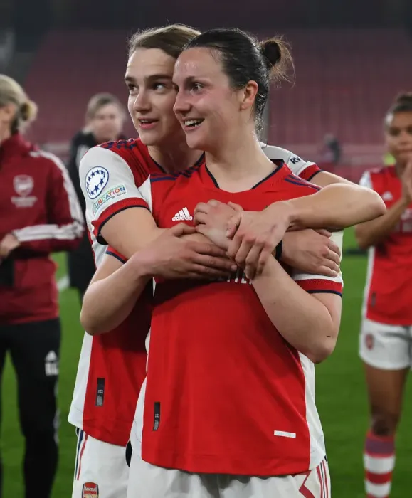 Framed Print : Arsenal Women Celebrate Quarter-Final Victory: Miedema and Wubben-Moy Embrace in Champions League Triumph