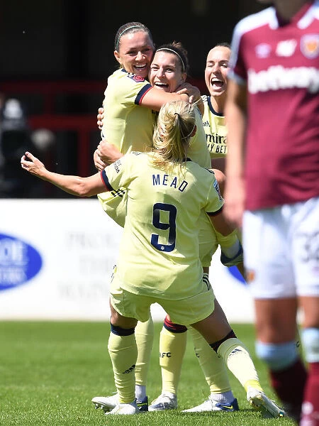 Arsenal Women Celebrate Steph Catley's Goal Against West Ham United Women in FA WSL Showdown