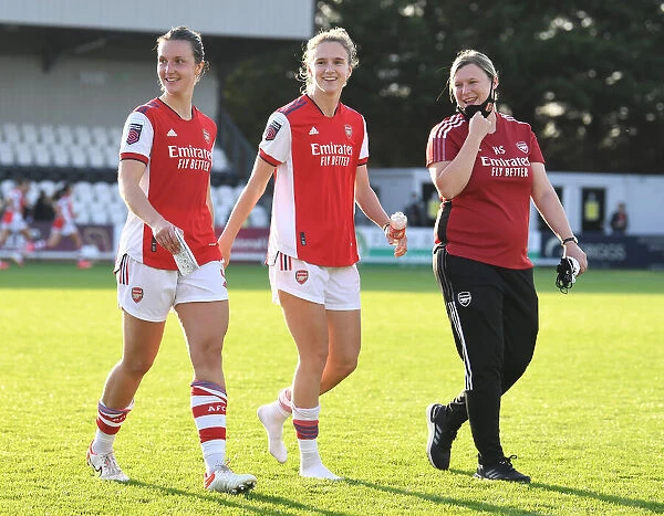 Arsenal Women Celebrate Victory Over Everton: Triumphant Moment for Lotte Wubben-Moy, Vivianne Miedema, and Holly Skinner