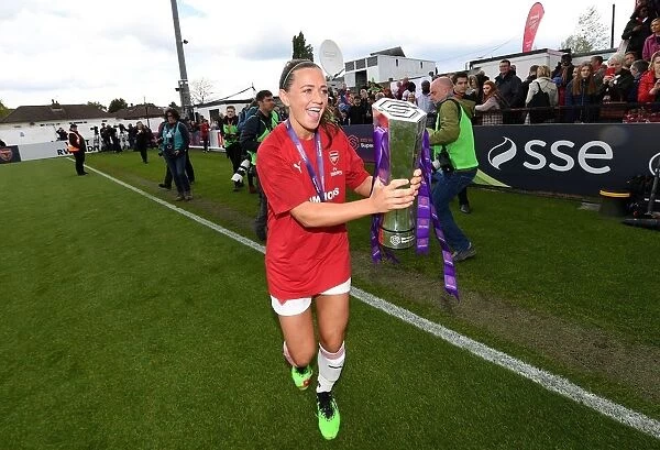 Arsenal Women Celebrate WSL Title Triumph with Katie McCabe and the Trophy