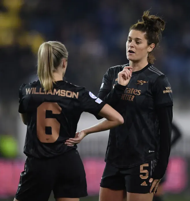 Framed Print : Arsenal Women in Deep Conversation During UEFA Champions League Match Against FC Zürich: Jennifer Beattie and Leah Williamson