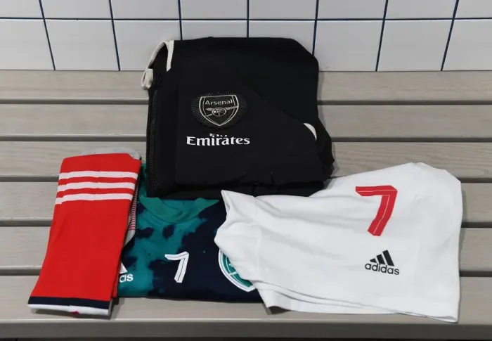 Framed Print : Arsenal Women Ready for FA WSL Clash Against Tottenham Hotspur: Behind the Scenes in the Changing Room
