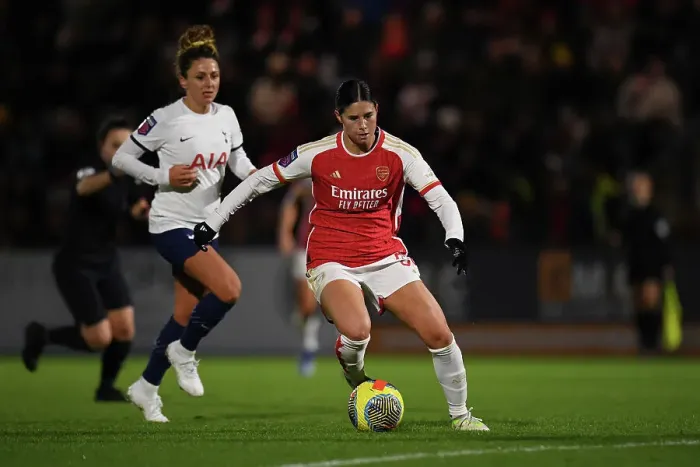 Framed Print : Arsenal Women vs. Tottenham Hotspur Women: Battle in the Conti Cup (2023-24) - Kyra Cooney-Cross of Arsenal Outruns Ramona Petzelberger of Tottenham Hotspur