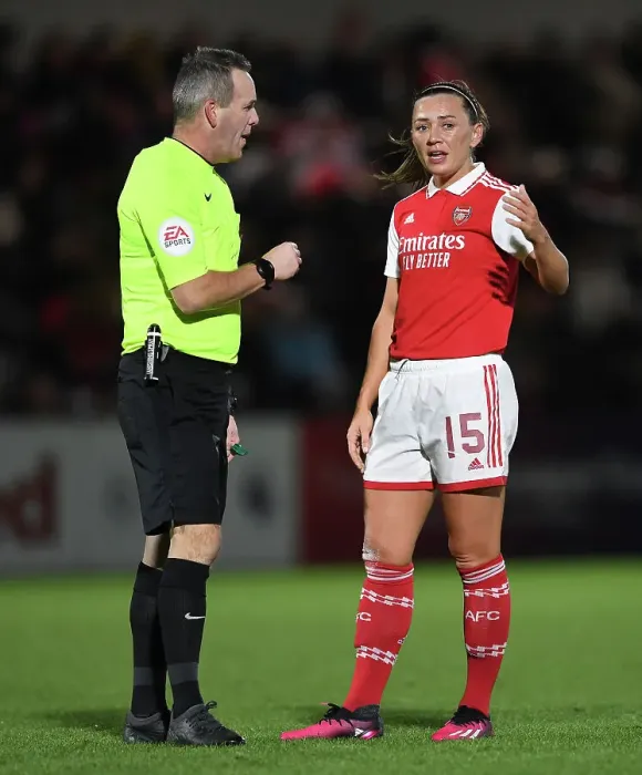 Framed Print : Arsenal Women vs. Aston Villa Women: McCabe and Referee in Deep Discussion during FA WSL Cup Match
