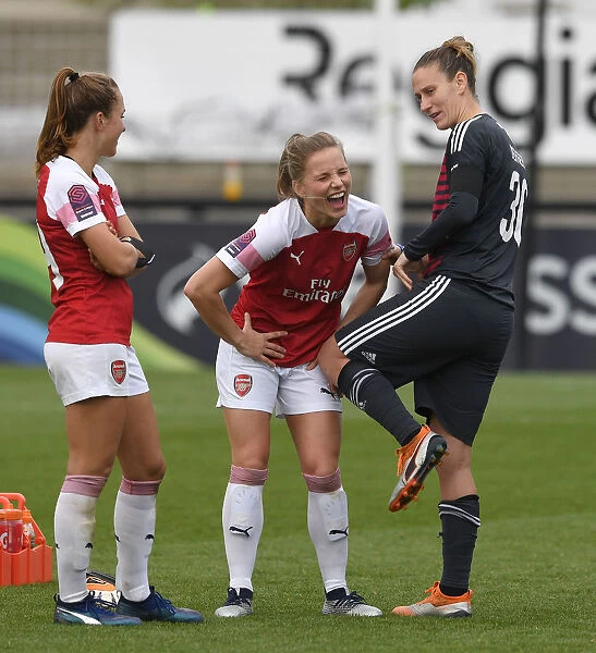 Arsenal Women vs. Birmingham Ladies: A Light-Hearted Moment Between Teammates Lia Walti, Tabea Kemme, and Ann-Katrin Berger