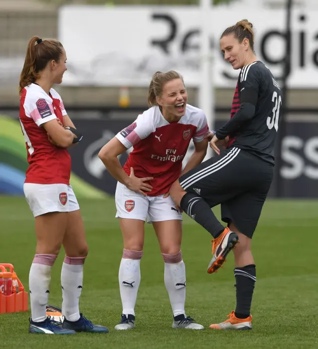 Framed Print : Arsenal Women vs. Birmingham Ladies: A Light-Hearted Moment Between Teammates Lia Walti, Tabea Kemme, and Ann-Katrin Berger