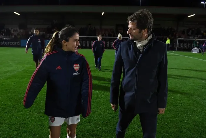 Framed Print : Arsenal Women vs Fiorentina Women: Montemurro and van de Donk in Deep Discussion during UEFA Champions League Match