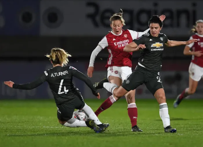 Framed Print : Arsenal Women vs Manchester United Women: Malin Gut Clashes with Amy Turner and Jess Sigsworth in Empty Meadow Park Framed Print : Arsenal Women vs Manchester United Women: Malin Gut Clashes with Amy Turner and Jess Sigsworth in Empty Meadow Park