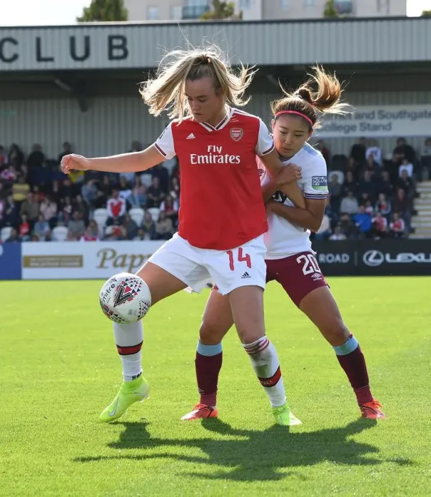 Framed Print : Arsenal Women vs. West Ham United: A Tight WSL Showdown - Jill Roord Fends Off Opponent