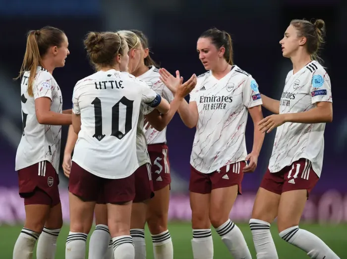 Framed Print : Arsenal Women's Champions League Triumph: Kim Little and Lisa Evans Celebrate Goal Against Paris Saint-Germain