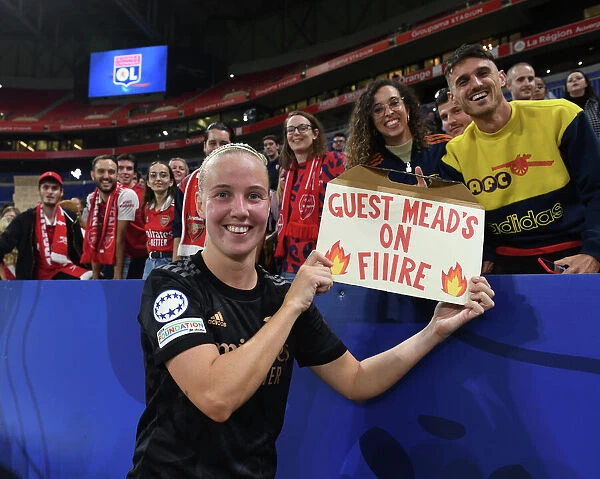 Arsenal Women's Champions League Victory: Beth Mead Celebrates with Fans after Olympique Lyonnais Match