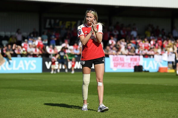 Arsenal Women's FA WSL Victory: Leah Williamson Celebrates with Adoring Fans