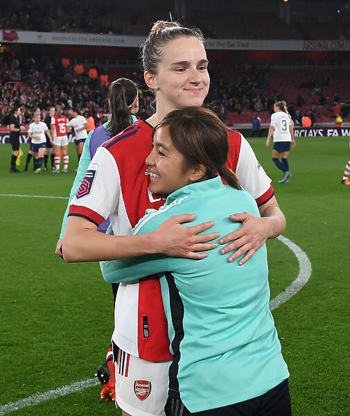 Arsenal Women's FA WSL Victory: Miedema and Iwabuchi Celebrate Championship Title with Arms Raised