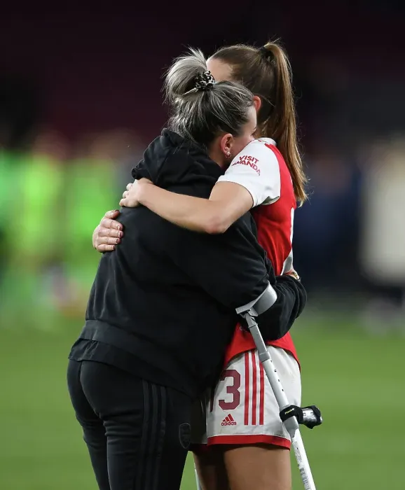 Framed Print : Arsenal Women's Heartbreak: Laura Wienroither Consoled by Lia Walti After Semifinal Defeat to VfL Wolfsburg Framed Print : Arsenal Women's Heartbreak: Laura Wienroither Consoled by Lia Walti After Semifinal Defeat to VfL Wolfsburg