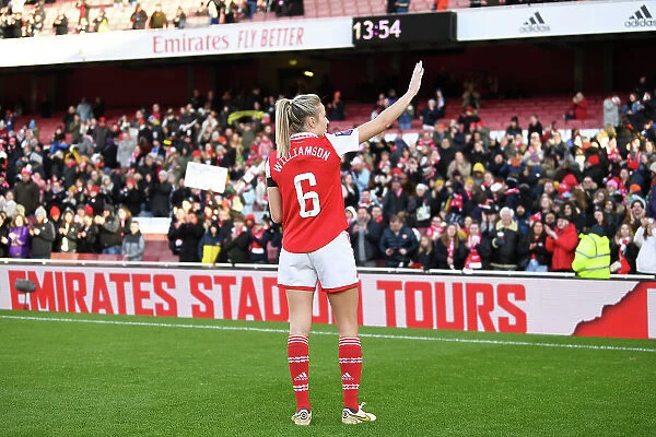Arsenal Women's Historic FA WSL Victory: Leah Williamson Celebrates with Adoring Fans at Emirates Stadium