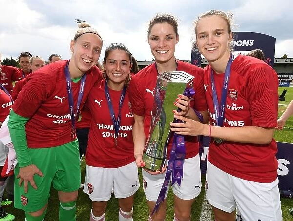 Arsenal Women's Historic Title Win: Van Veenendaal, Van de Donk, Bloodworth, and Miedema Celebrate with the Trophy