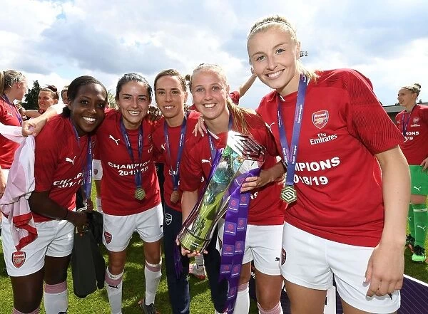 Arsenal Women's Historic WSL Title Win: Carter, Nobbs, Mead, Williamson, and van de Donk Celebrate with the Trophy