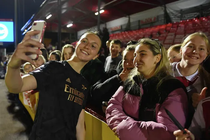 Framed Print : Arsenal Women's Player Lotte Wubben-Moy Interacts with Fan after Brighton Match