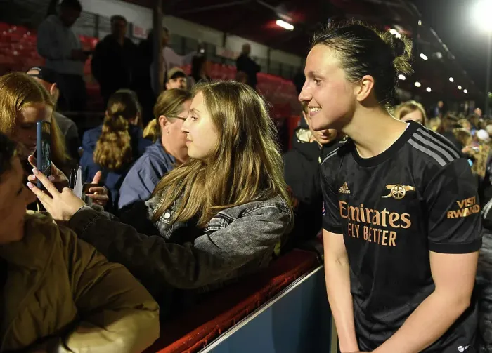 Framed Print : Arsenal Women's Player Lotte Wubben-Moy Takes a Selfie with Fan after Brighton Match Framed Print : Arsenal Women's Player Lotte Wubben-Moy Takes a Selfie with Fan after Brighton Match