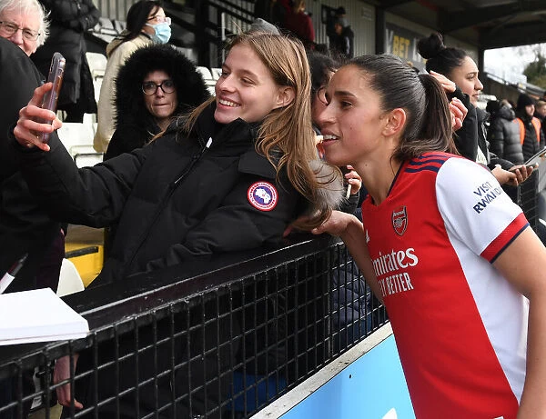 Arsenal Women's Rafaelle Celebrates FA WSL Victory with Fan