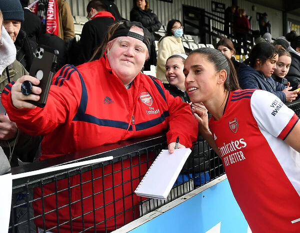 Arsenal Women's Rafaelle Celebrates FA WSL Title with Fan