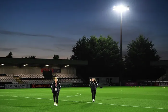 Framed Print : Arsenal Women's Squad Conducts Pre-Match Pitch Inspection Ahead of Arsenal vs West Ham United