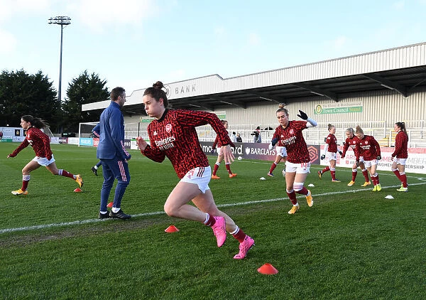 Arsenal Women's Squad Gears Up: Intense Warm-Up Before Arsenal vs. Everton FA WSL Match