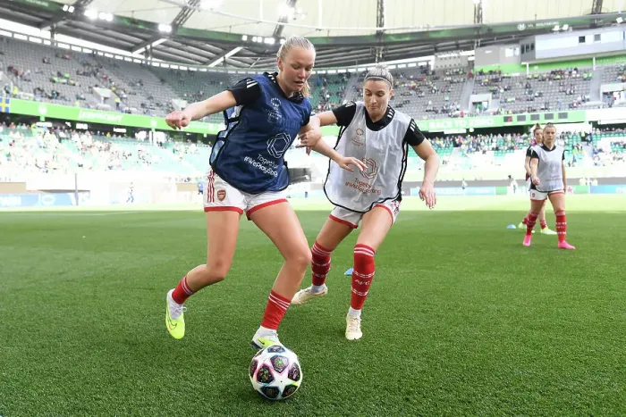 Framed Print : Arsenal Women's Squad Warm-Up Ahead of VfL Wolfsburg Semi-Final Showdown