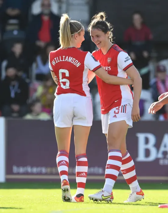 Framed Print : Arsenal Women's Super League Victory: Lotte Wubben-Moy and Leah Williamson Celebrate Goal Against Everton