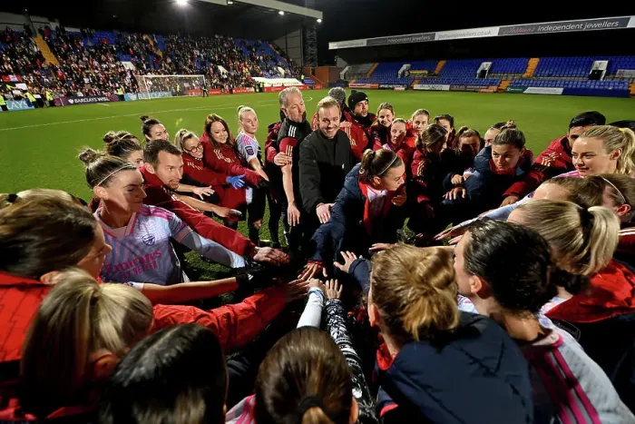 Framed Print : Arsenal Women's Team Huddle with Manager Jonas Eidevall after Liverpool FC Match