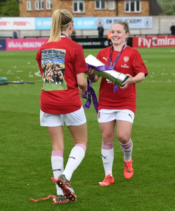 Framed Print : Arsenal Women's Team: Kim Little and Leah Williamson Lift the WSL Trophy