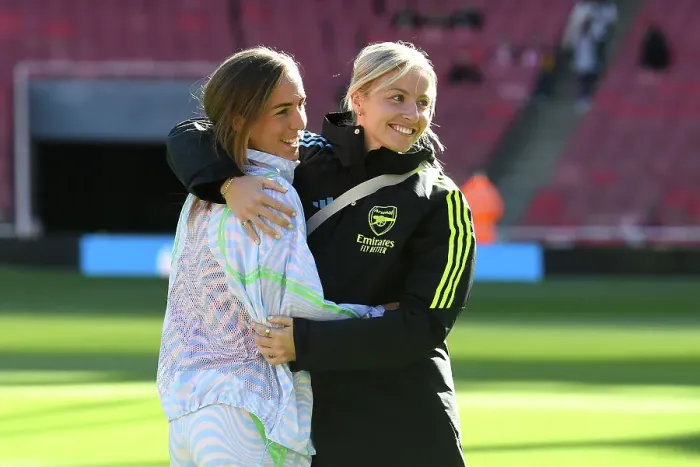 Framed Print : Arsenal Women's Team: Lia Waelti and Leah Williamson Embrace Ahead of Arsenal v Aston Villa (2023-24)