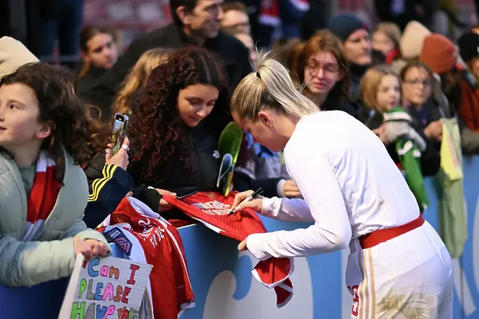 Framed Print : Arsenal Women's Triumph at Brighton: Alessia Russo Celebrates with Fan after Match Win Framed Print : Arsenal Women's Triumph at Brighton: Alessia Russo Celebrates with Fan after Match Win