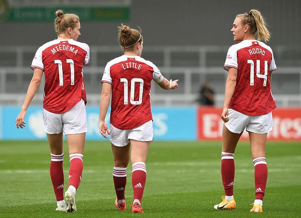 Arsenal Women's Triumph: Vivianne Miedema, Kim Little, and Jill Roord Celebrate First Goal Against Reading Women