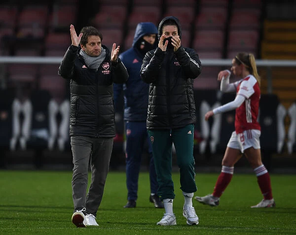 Arsenal Women's Victory: Manager Joe Montemurro and Captain Jennifer Beattie Celebrate with Fans