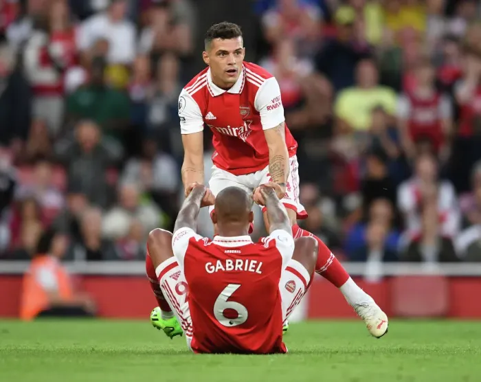 Framed Print : Arsenal: Xhaka Comforts Injured Magalhaes vs Aston Villa (2022-23)