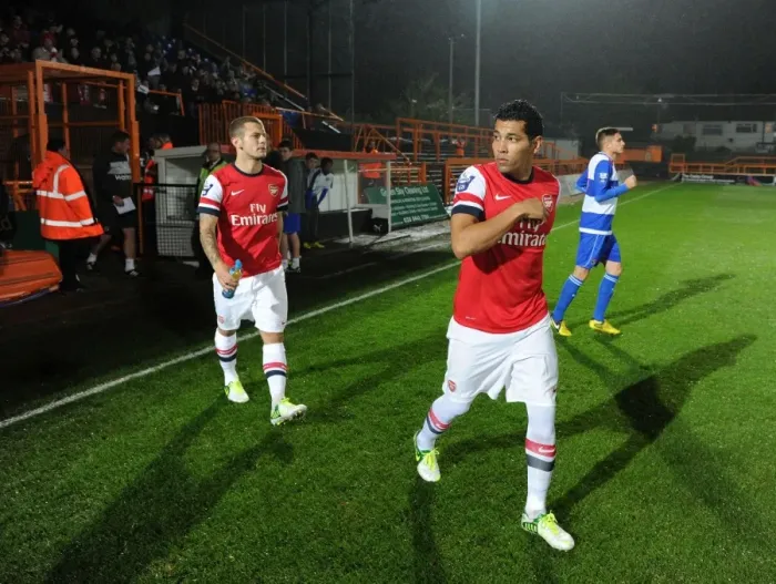 Framed Print : Arsenal Young Guns: Andre Santos and Jack Wilshere Prepare for Action against Reading U21