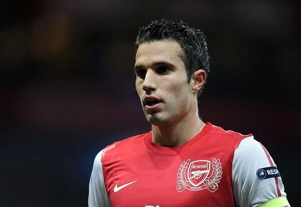 Arsenal's 3-0 Victory Over AC Milan: Robin van Persie Shines in UEFA Champions League